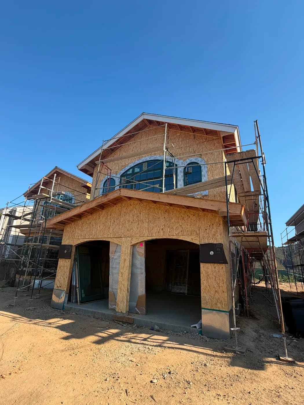Home addition framing with OSB sheathing by Top Tech Builders