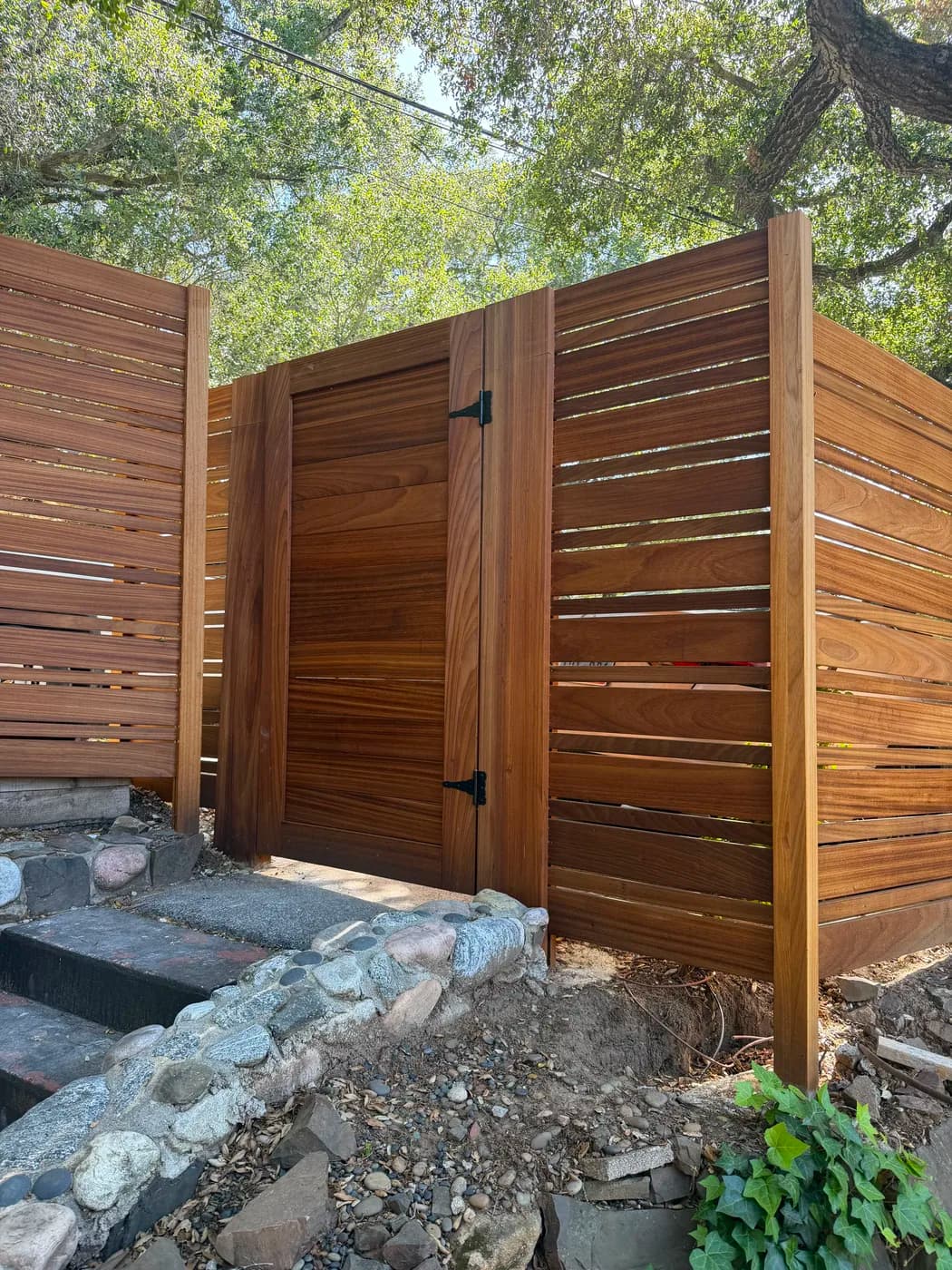 Custom wood privacy fence and gate by Top Tech Builders