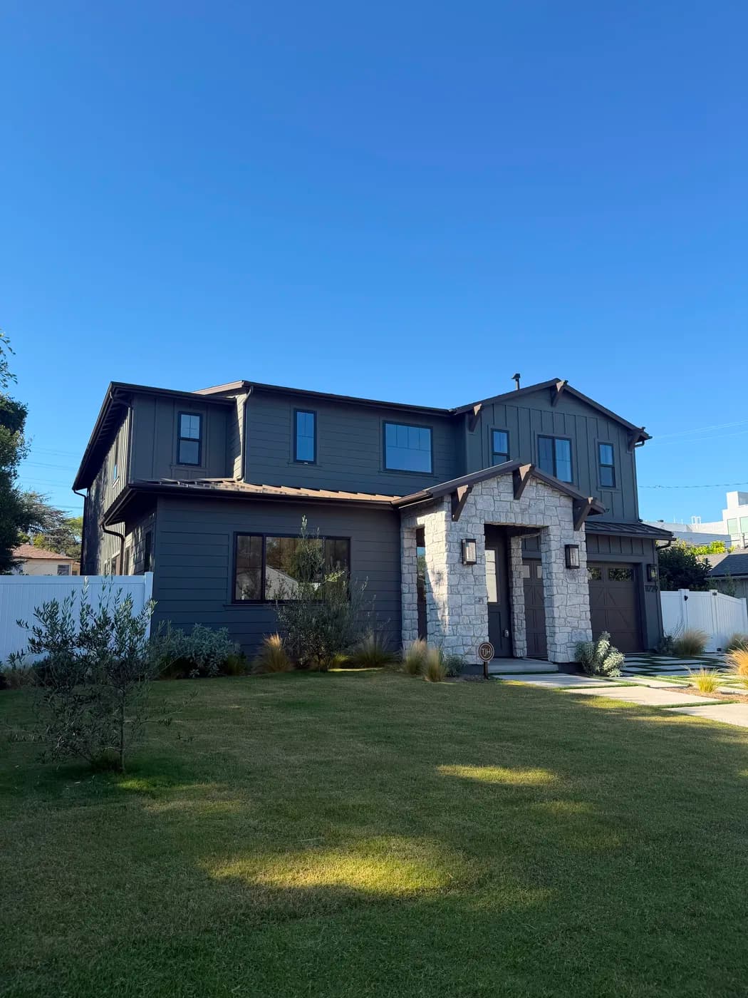 Completed modern farmhouse home exterior remodel by Top Tech Builders