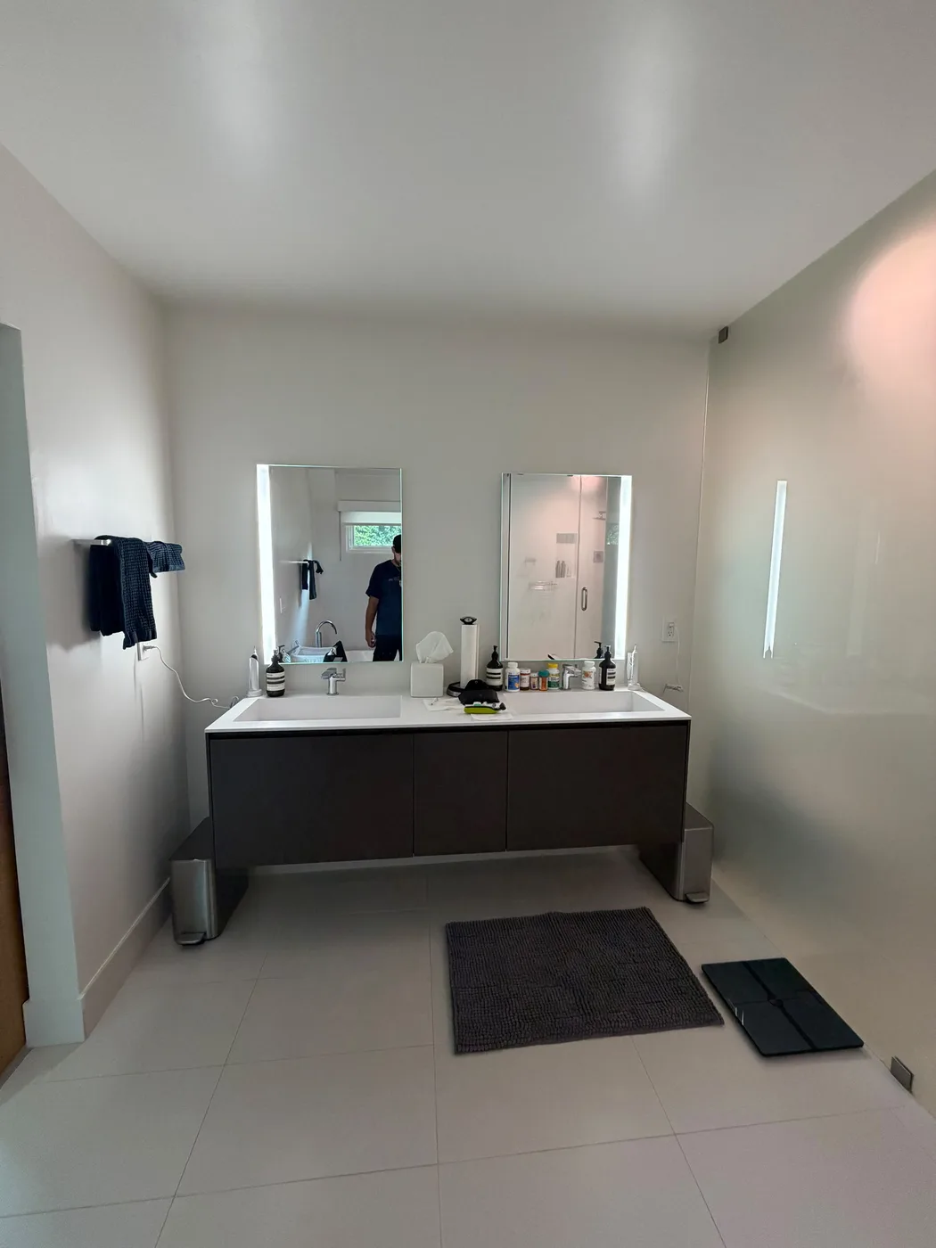 Double vanity in remodeled bathroom by Top Tech Builders