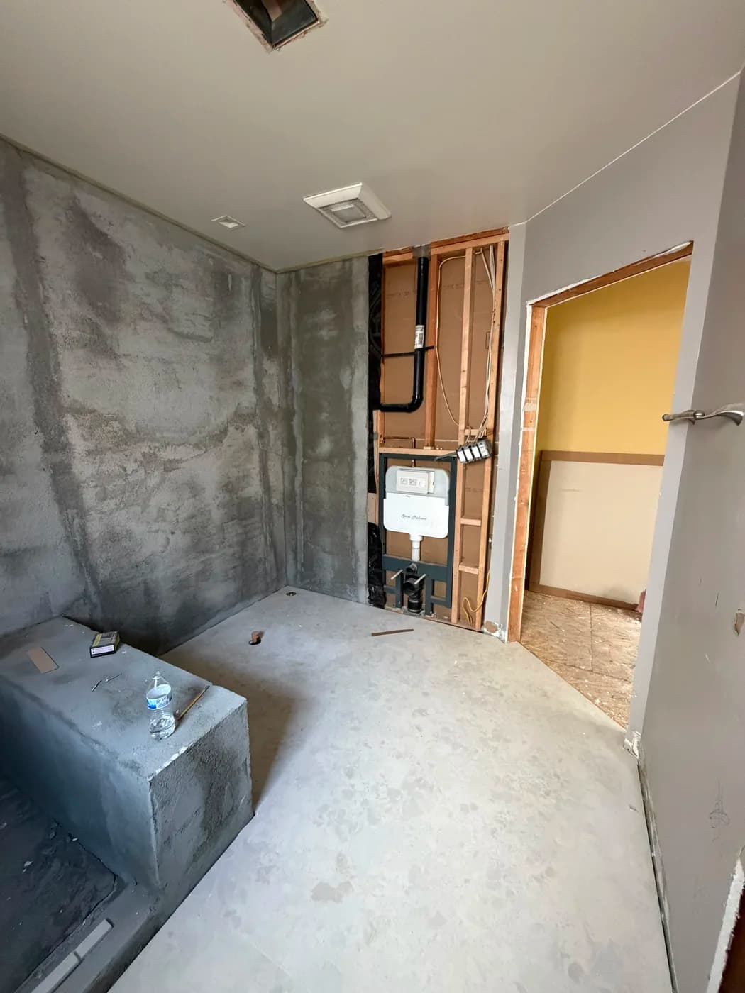 Bathroom plumbing rough-in by Top Tech Builders