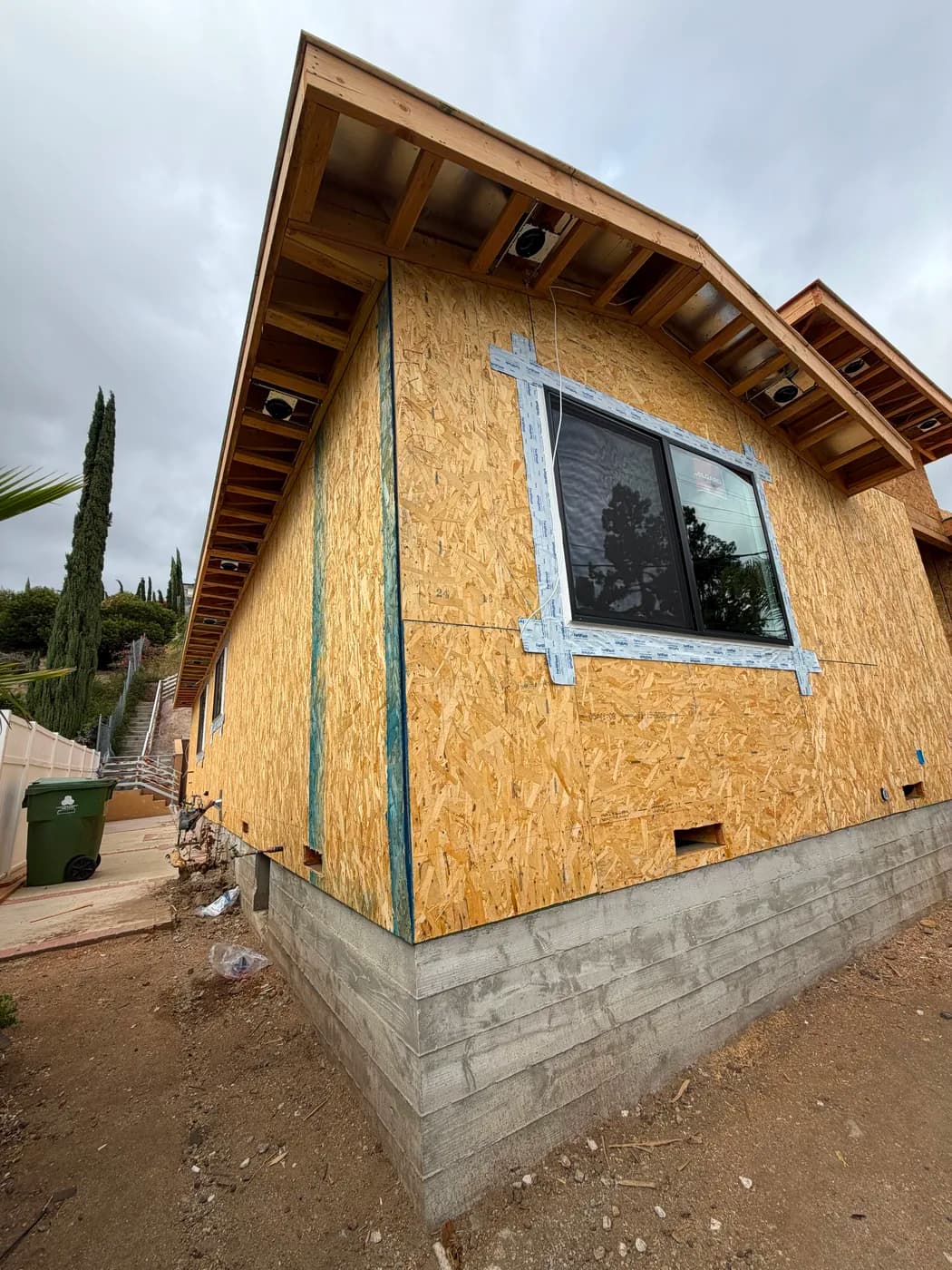 Home addition corner framing and roof eave by Top Tech Builders