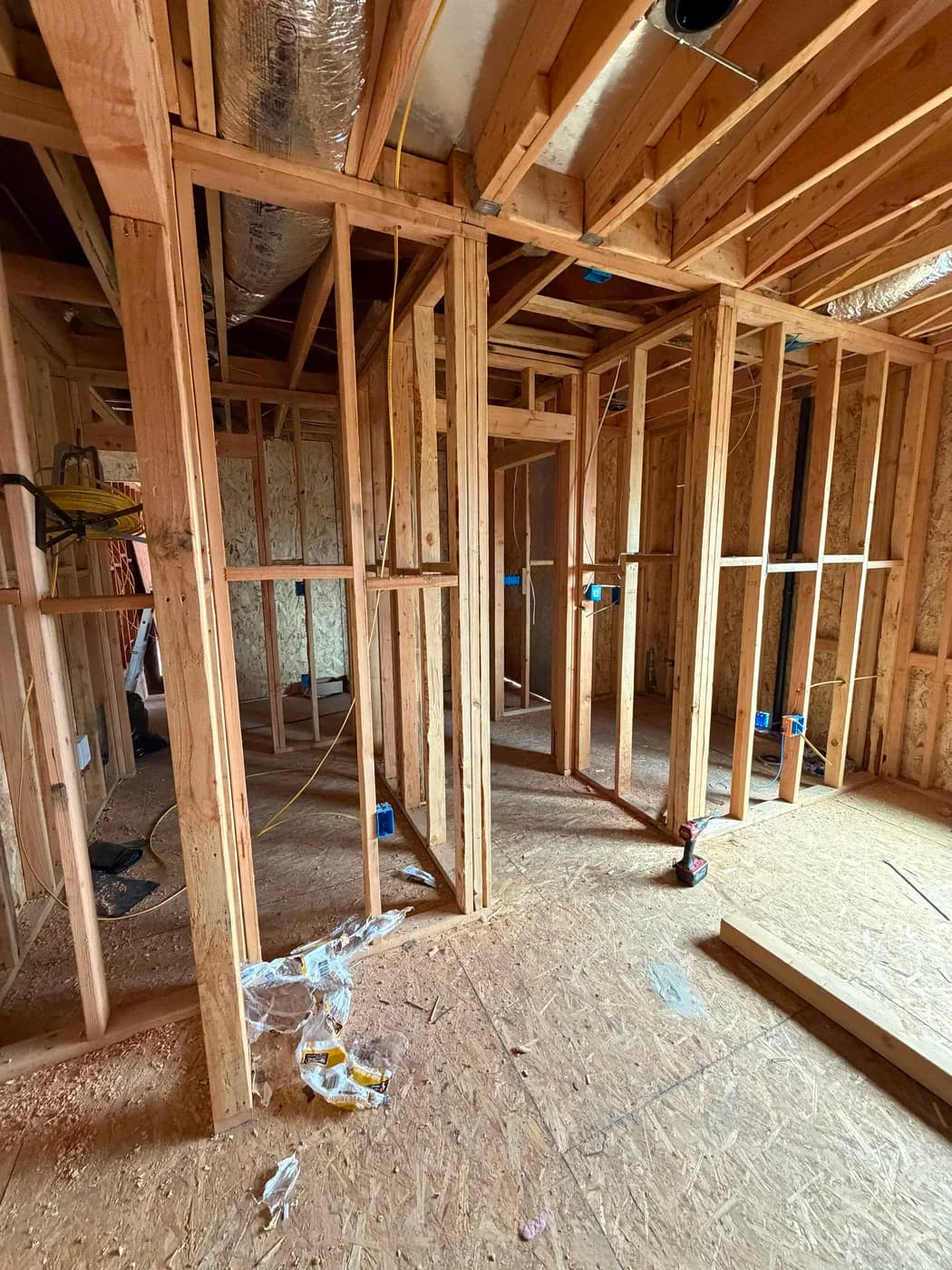 Interior room framing during whole-home remodel by Top Tech Builders